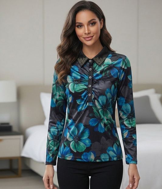 Woman wearing a floral patterned shirt in a bedroom setting