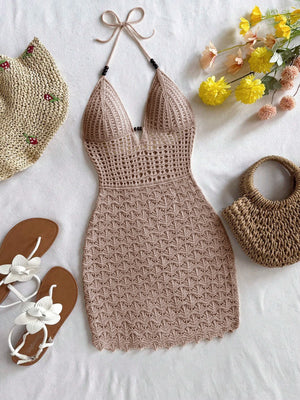 Brown crochet dress with accessories on a light background