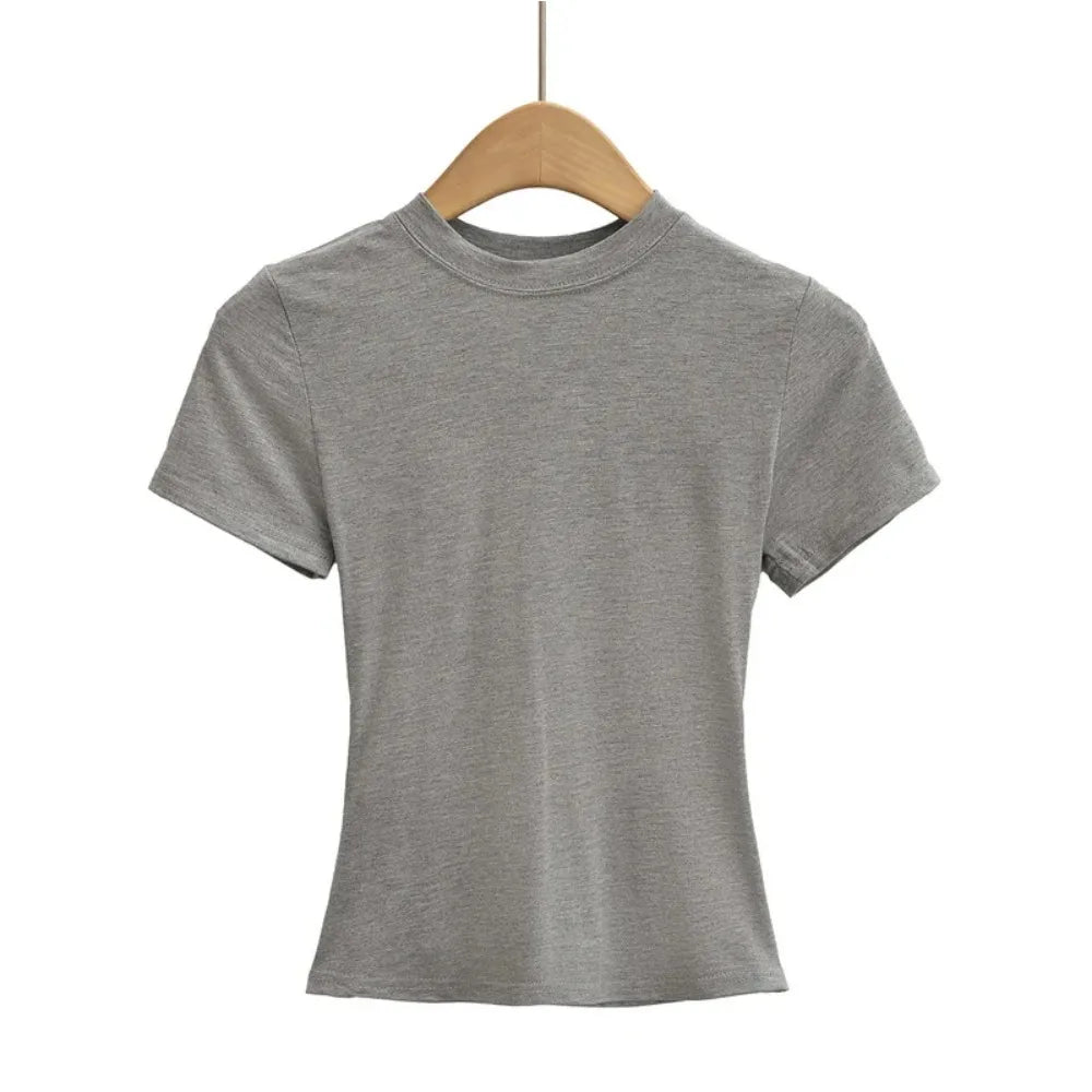 Gray t-shirt on a wooden hanger against a white background