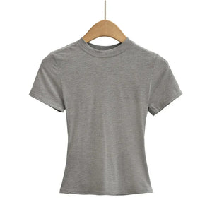 Gray t-shirt on a wooden hanger against a white background